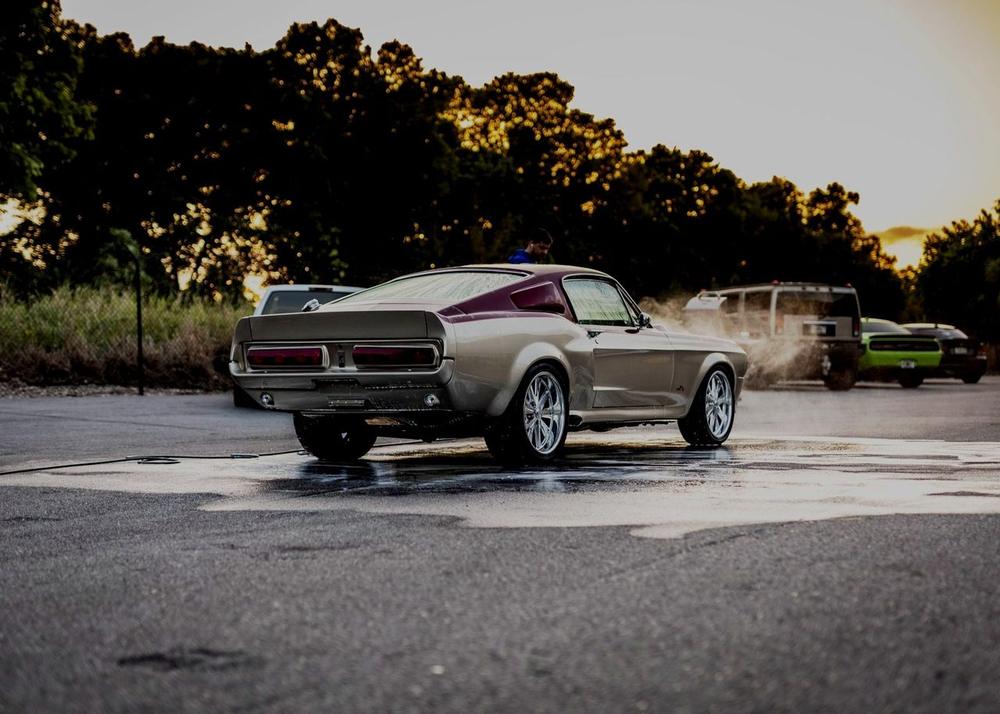 Silver classic muscle car restored to a deep gloss by multi-stage paint correction in Baltimore