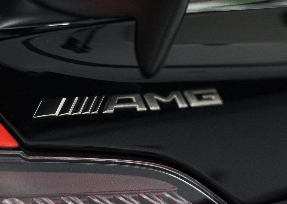 Deep ceramic-coated gloss on black Mercedes-AMG paint detailed in Baltimore